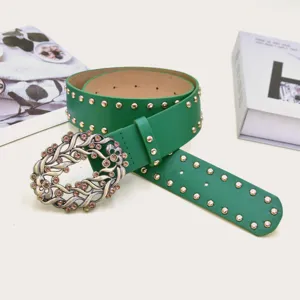 Vintage green leather women belt with sparkly rhinestones and metal studs detail view.