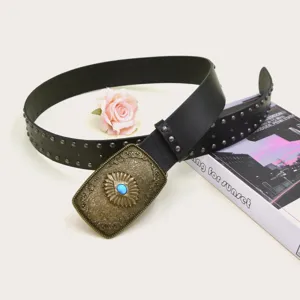 Vintage wide belt with ornate bronze buckle and metallic studs for retro styling.