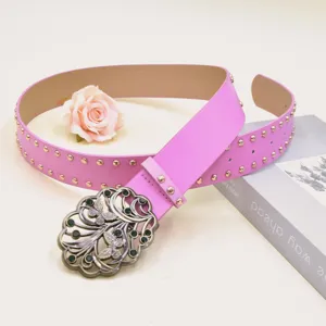 Pink Y2K wide leather belt with metal studs and vintage butterfly buckle for women fashion.