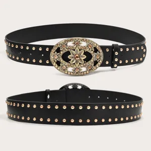 Women vintage black belt with rhinestone floral buckle and metal studs detail view.