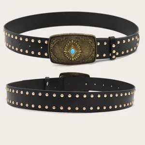 Vintage ethnic wide belt for women featuring a detailed ornate buckle, turquoise stone and metal studs.