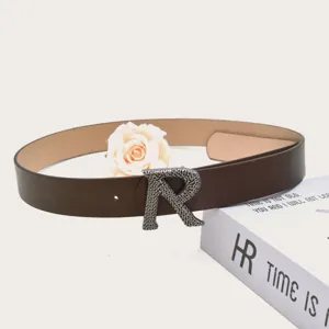 Women stylish brown PU leather belt featuring a unique metallic textured letter R buckle.