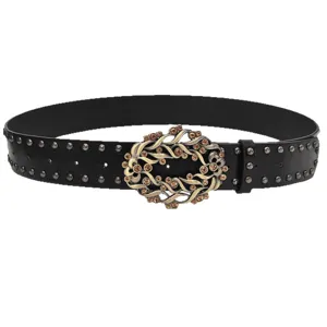 Vintage rhinestone women belt with metal studs and ornate buckle for chic fashion styling.