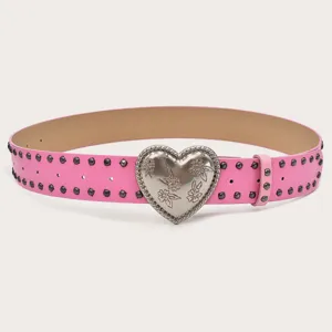Punk style pink leather belt featuring a large heart buckle and cool metal studs for women.