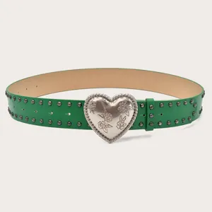 Detailed view of the green punk rivet leather belt with a carved heart metal buckle.