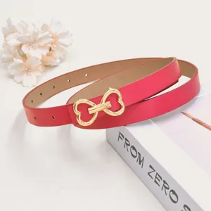 Red thin women belt with gold heart metal buckle, stylish detail shot for daily trousers.
