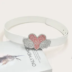 Detailed shot of trendy rhinestone heart wing belt with sparkling pink stones for daily wear.