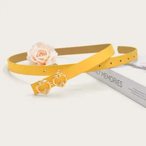Women's chic yellow thin leather belt featuring a stylish gold double round metal buckle design.