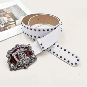 Detailed view of punk style white leather belt with metal skull buckle and dark gothic rivets.