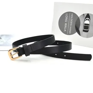 Black leather belt detail with golden pin buckle, perfect for dresses and jeans styling.
