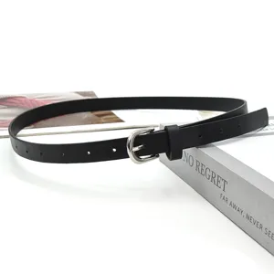 Detailed view of women black PU leather thin belt featuring a stylish silver buckle.