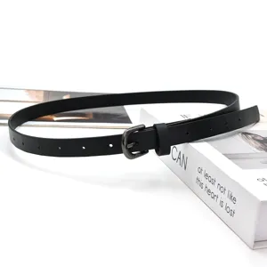 Close-up detail shot of a black PU leather thin belt with metal buckle, versatile women accessory