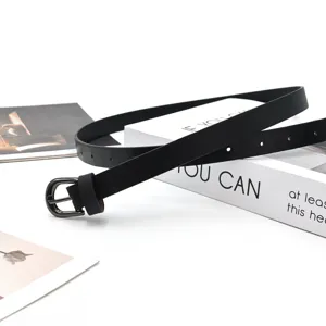 Black PU leather narrow belt detail shot, stylish women decorative jeans accessory.