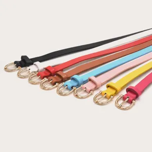 Detailed view of women's thin PU leather belts in vibrant multi-colors with gold buckles.