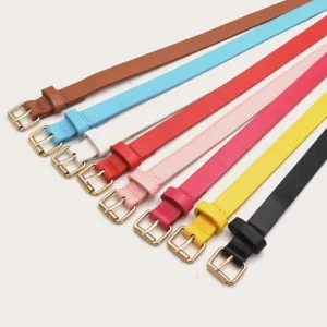 Close-up detail view of colorful thin leather belts with gold pin buckles, multi-color set.
