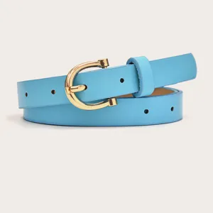 Detailed view of light blue women PU leather thin belt with gold buckle for dress styling.
