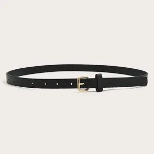 Minimalist black thin leather belt detail showing the elegant gold-tone pin buckle.