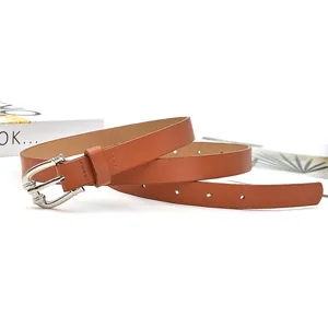 Women's casual brown PU leather belt with silver metal buckle, elegant waist detail.