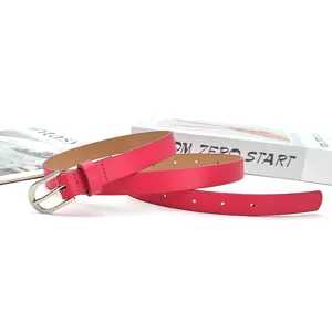 Pink leather belt for women, slim design with silver buckle, casual elegant waist accessory.
