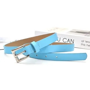 Light blue women leather belt featuring silver pin buckle stylish minimalist accessory.