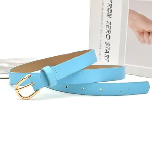 Women's thin leather belt detail close-up, stylish light blue strap with gold metal buckle.