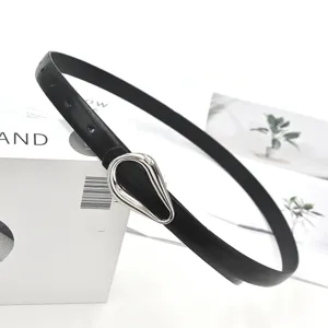 Women black PU leather belt with minimalist silver horseshoe buckle, stylish dress waist cincher.