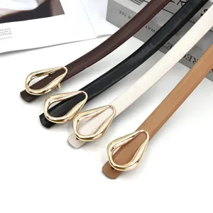 Women thin PU leather belt with gold horseshoe buckle, simple versatile dress waist accessory.