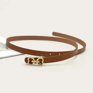 Slim brown leather belt featuring a chic gold tone heart buckle, versatile for dresses.