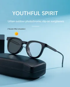 Detailed view of urban outdoor photochromic square sunglasses with clip-on design in black.