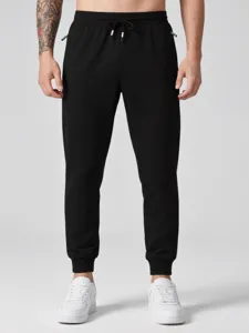 Men's casual black sweatpants with adjustable drawstring and elastic cuffs for active daily wear.