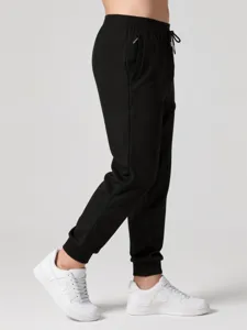 Men's black casual jogger pants with elastic drawstring waist and cuffed hem for daily wear.