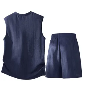 Detailed view of the dark blue mens summer sleeveless vest and shorts set showcasing textured fabric.