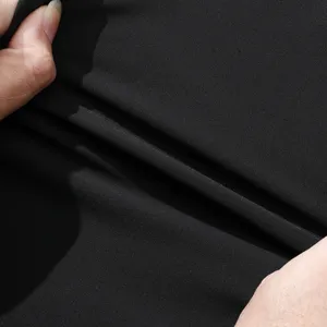 Men quick dry pants detail shot, stretch fabric texture display for sports and leisure.