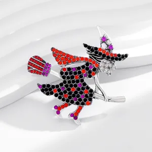 Broche bruja Halloween estrass escoba voladora accesorio moda elegante diseno unico original.