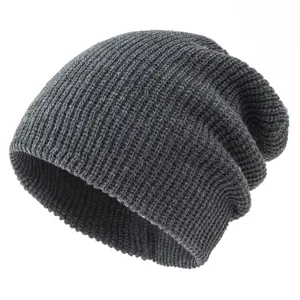 Dark grey knitted slouchy beanie hat detail, soft winter warm cap for men and women daily wear.