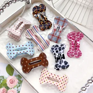 Leuke botvormige haarclips met diverse retro prints zoals luipaard, ruitjes en stippen.