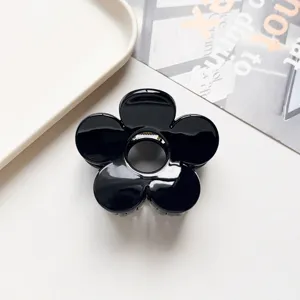 Black flower hair claw clip, glossy PC hair catch for women sweet versatile half up styling.