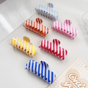 Colorful striped hair claw clip set, summer fresh PVC shark clips for women and daily hair styling.