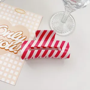 Red and white striped PVC hair claw clip, stylish summer hair accessories for daily wear.