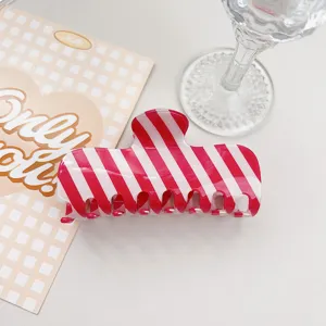 Stylish red and white striped PVC hair claw clip, summer fresh minimalist shark clip for daily wear.