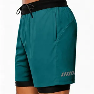 Detail shot of men's 2-in-1 athletic shorts featuring elastic waistband and reflective stripe.