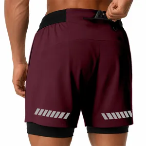 Detail view of men's dual-layer athletic shorts featuring zipper pocket and reflective stripes.