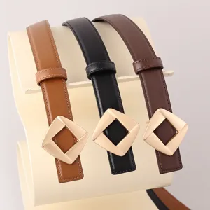 Women's thin leather belt detail featuring a stylish gold geometric buckle for versatile daily wear.