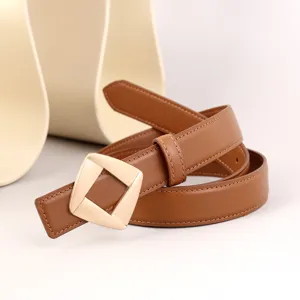 Brown leather belt detail, stylish golden geometric buckle, premium women dress belt accessory.