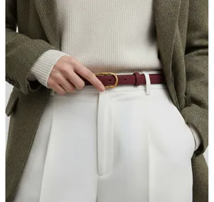 Close-up detail of burgundy suede women belt with metal buckle for chic daily commute.