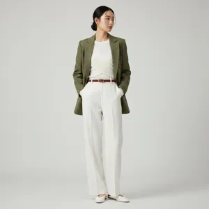 Women slim leather belt matched with elegant commuting outfit, vintage style clothing detail.