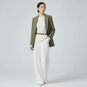 Elegant women's apparel detail view featuring stylish blazer and sleek belt accessory.