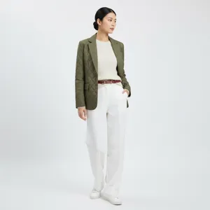 Styling detail shot of a thin retro decorative women waist belt worn with autumn outfit.