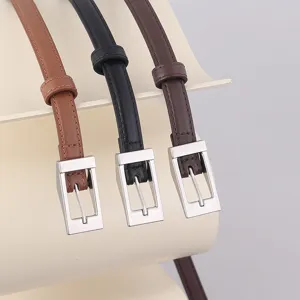 Slim women's leather belt featuring a classic silver pin buckle and three versatile colors.