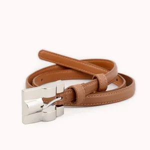 Brown leather thin belt detail shot, elegant silver metallic buckle, premium accessory design.